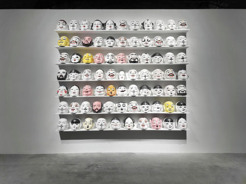 Qiu Zhijie, The Greeting, 2013, paper masks, silicone masks. Installation view at Anren Biennale, 2017