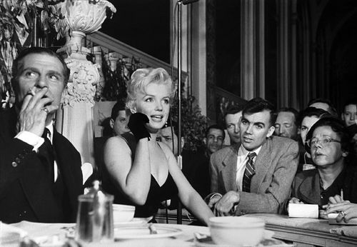 Eve Arnold, USA. New York City. Waldorf - Astoria Ballroom . Prior to the filming of ‘The Prince and the Showgirl’, US actress Marilyn Monroe and British actor Laurence Olivier held a press conference, 1956